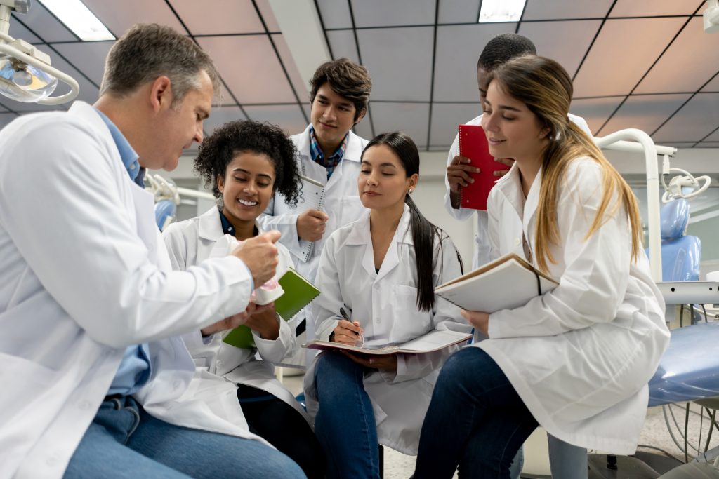 Dental Students being taught in a class or lab