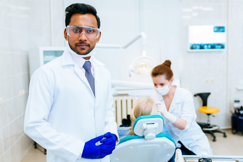 Young Graduate Dentists in an exam room