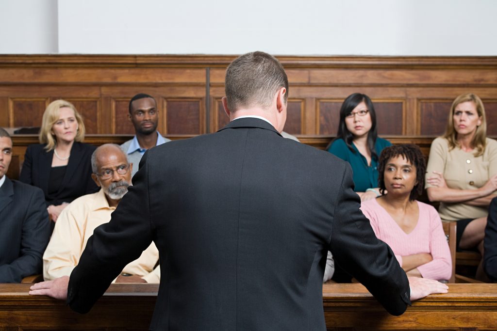 A lawyer speaking in front of a jury